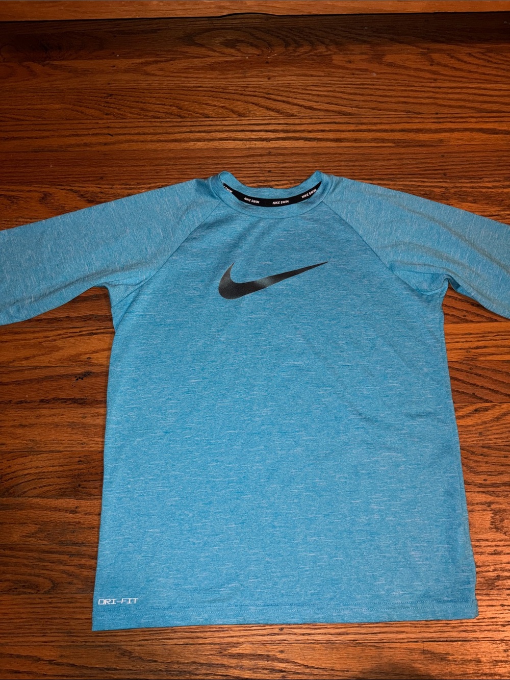 Nike Light Blue Dri-fit swim shirt size large